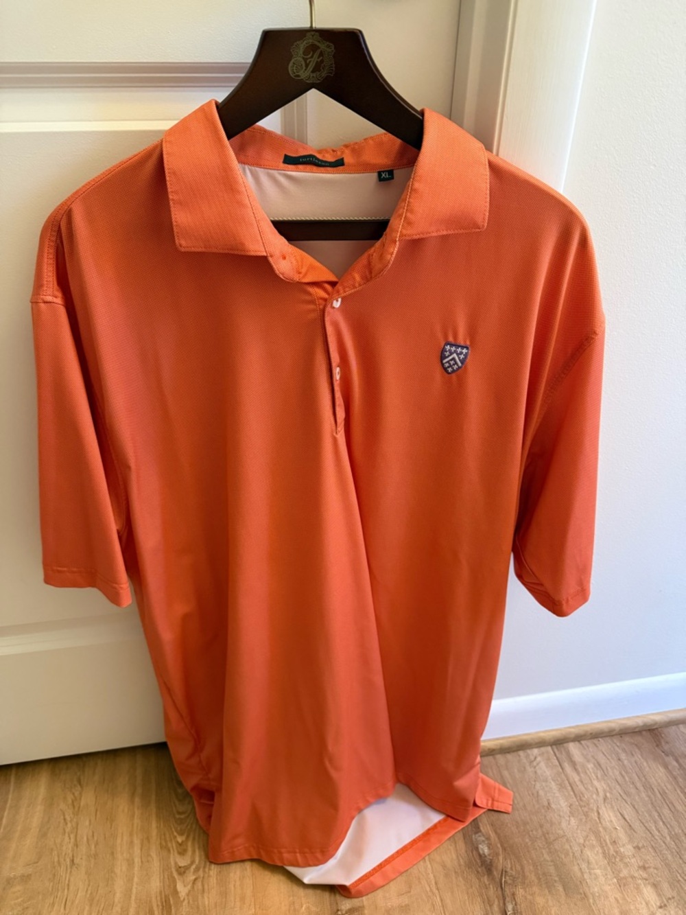 Men's Orange Short Sleeve Performance Polo with Crest
